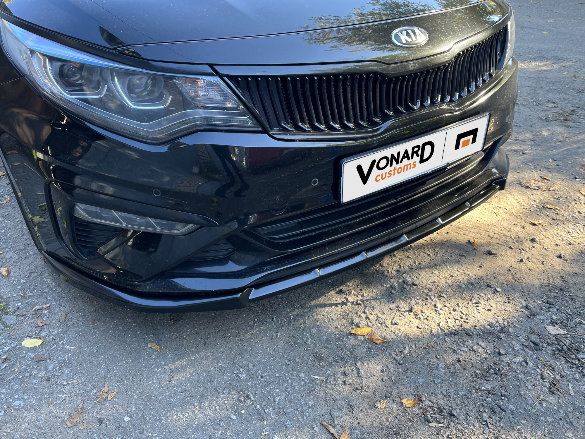 картинка Сплиттер переднего бампера Kia Optima 4 FL - чёрный металлик vonard customs 