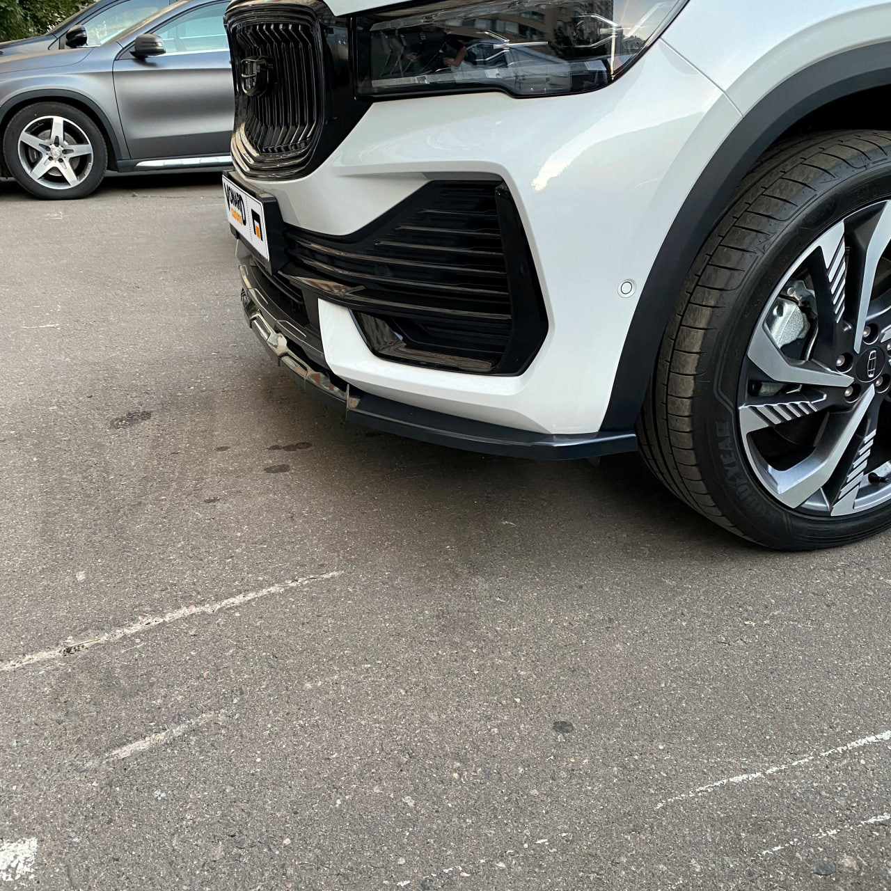 картинка Сплиттер переднего бампера Geely Monjaro 1 - под покраску vonard customs 